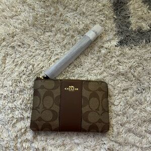 NWT! Coach wristlet.